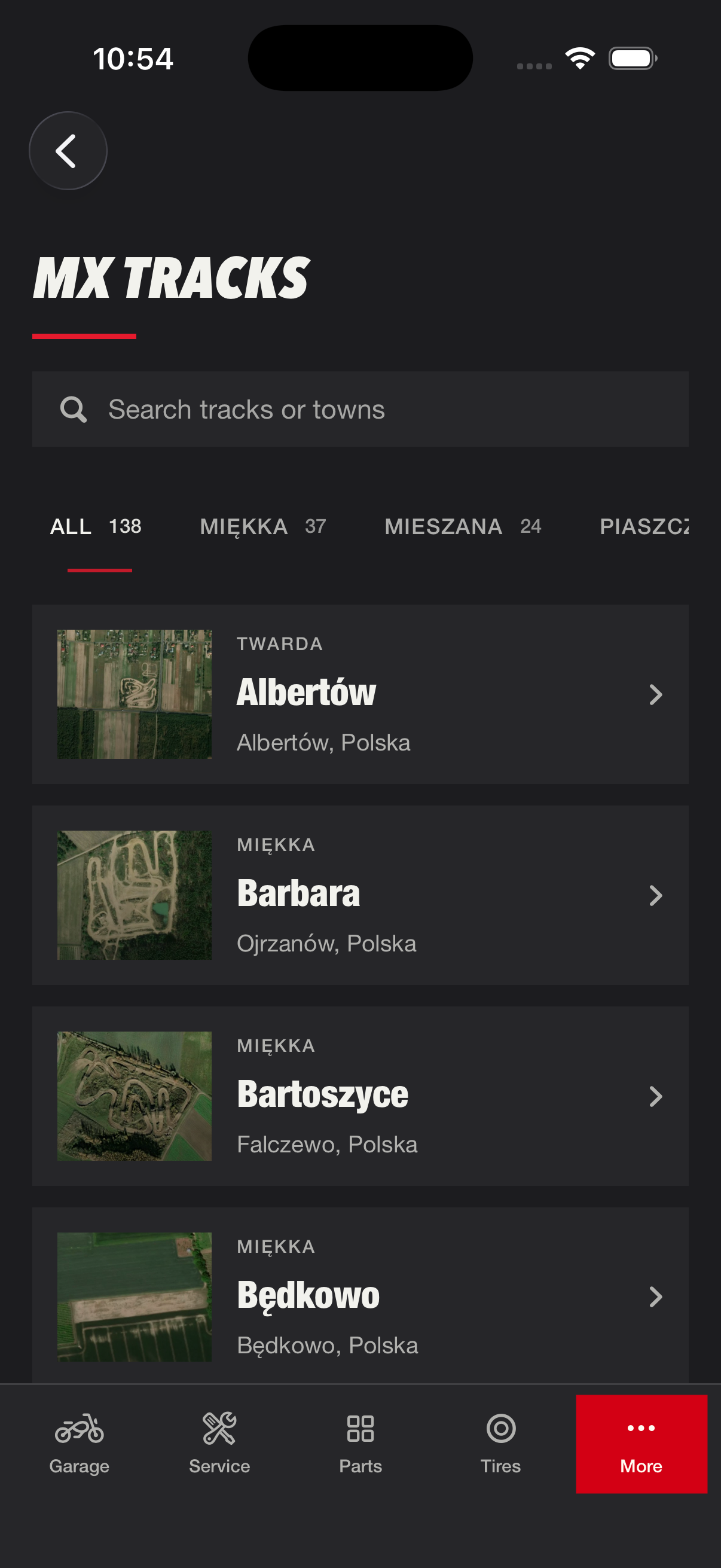 MX Tracks screen with a list of motocross tracks